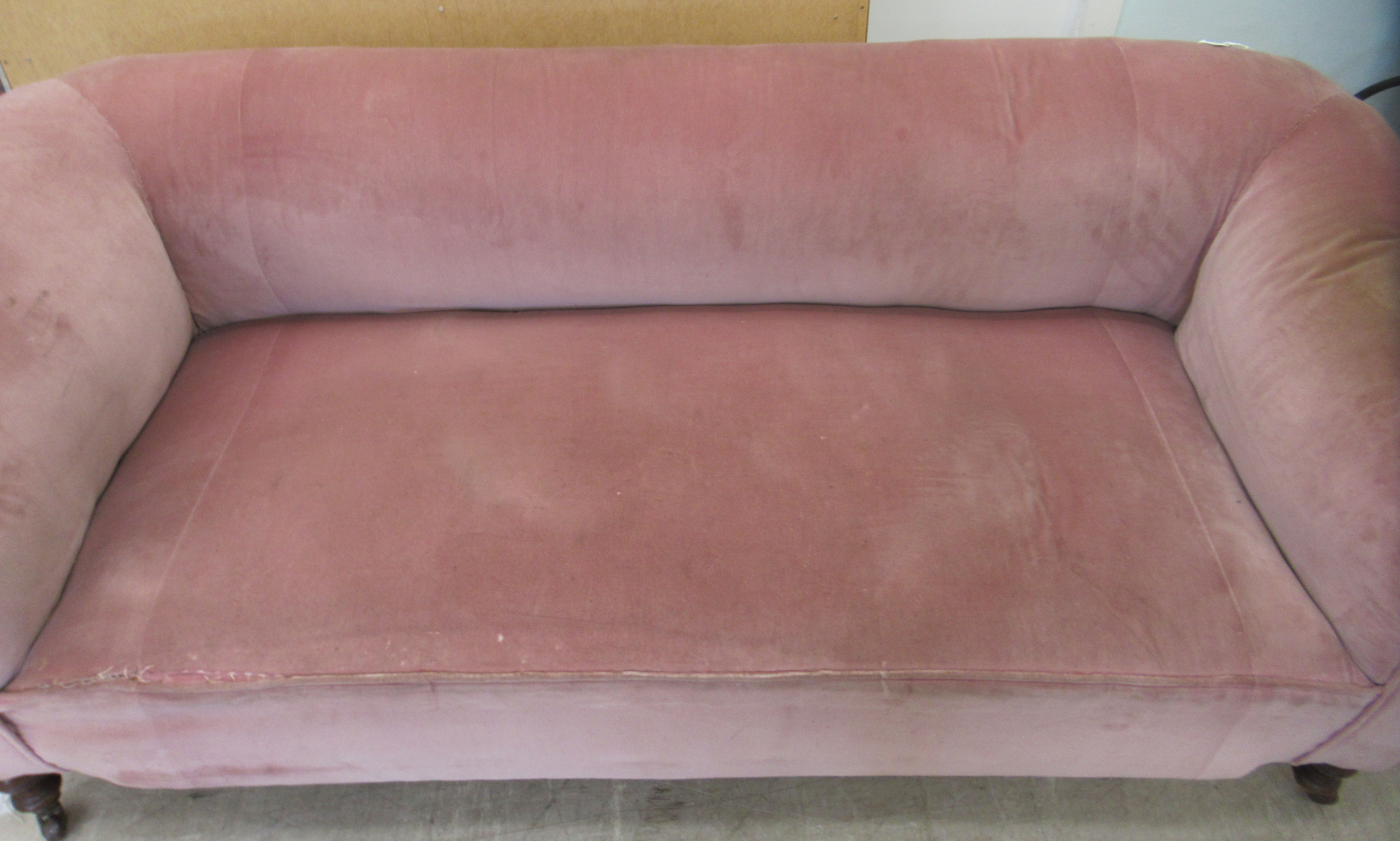 An Edwardian and later upholstered Chesterfield, raised on ring turned forelegs and casters  74"w, - Image 2 of 4