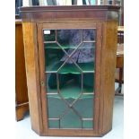 A late 19thC mahogany and oak and glazed corner cabinet  37"h  27"w