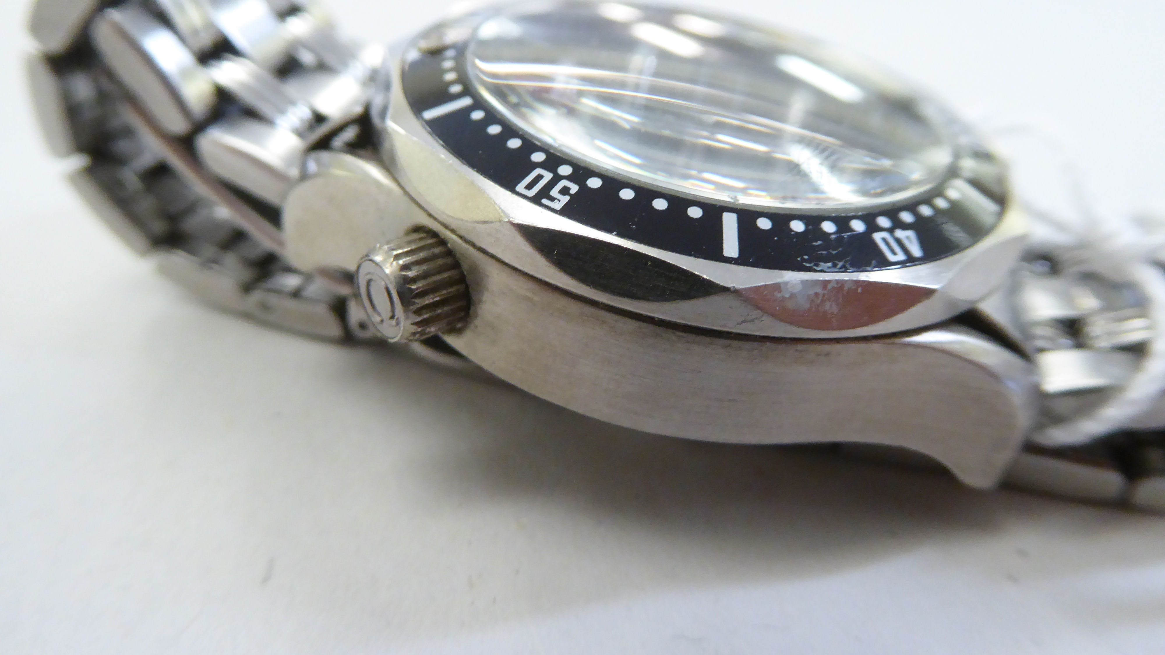 A modern stainless steel cased bracelet wristwatch, faced by a black baton dial, incorporating three - Image 6 of 6