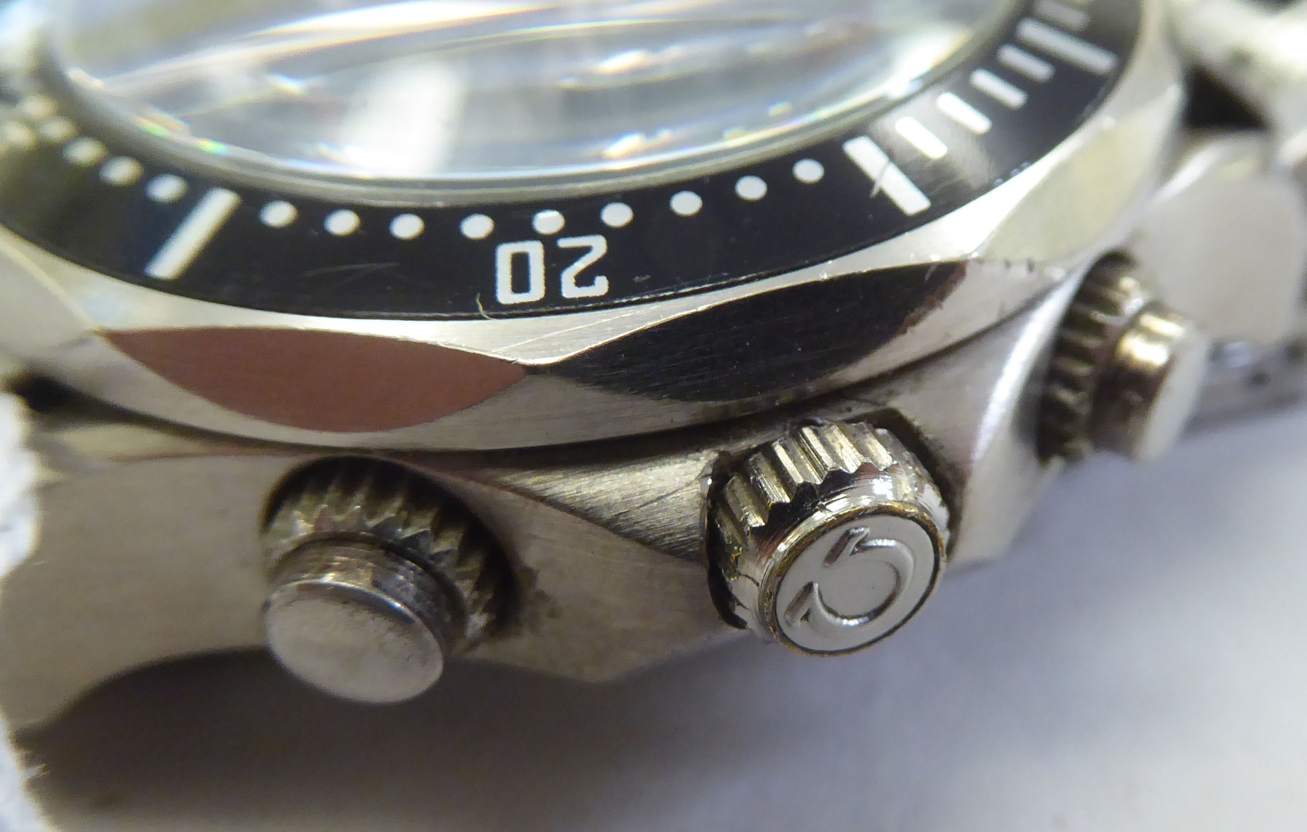 A modern stainless steel cased bracelet wristwatch, faced by a black baton dial, incorporating three - Image 5 of 6