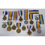 Thirteen British Great War medals, some copies, variously inscribed with the soldiers' names,