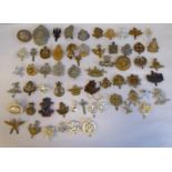 Approx. fifty military cap badges and other insignia, some copies: to include Mine Clearance;