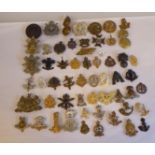 Approx. fifty military cap badges and other insignia, some copies: to include London Scottish; Corps