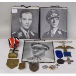 A German World War II Knight's Cross on a ribbon; an SS 4 year Long Service medal on a ribbon; and
