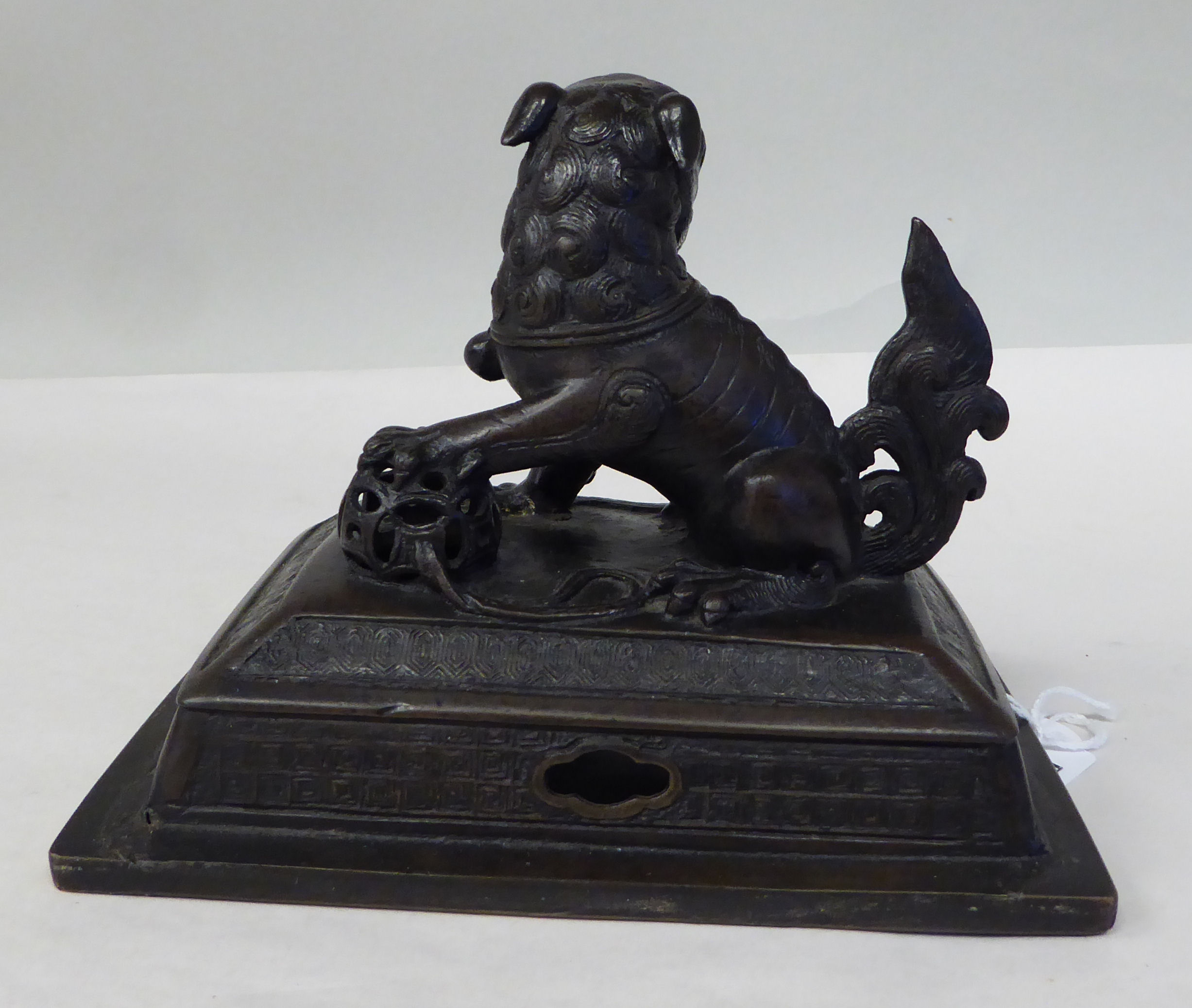 A Chinese cast and patinated bronze censer cover, surmounted by a Dog of Fo  5.5"h - Image 3 of 6