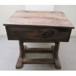 A 19thC boarded coromandel desk with a box top, enclosed by an angled, hinged scriber, on trestle