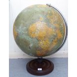 A vintage Philips' Terrestrial Globe  19"dia, on a tubular chromium steel arm and a turned, mahogany