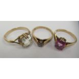 Three 9ct gold rings, set with various coloured stones