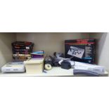 A Super Nintendo entertainment system with accessories and games: to include Street Fighter 2, Super