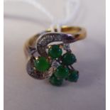 A 14ct gold jade and diamond organic design ring