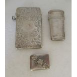 A Sterling silver stamp box with a hinged lid; a 19thC bright-cut engraved silver card case; and a