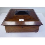 A Regency rosewood box of sarcophagus form with a hinged lid, on flat bun feet  5.5"h  13.5"w