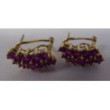 A pair of 9ct gold ruby cluster earrings