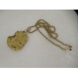 An 18ct gold ropetwist chain with a gold nugget pendant
