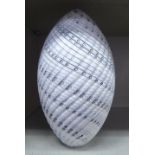 An Art glass ornament of ovoid form with white and brown spiral ornament  9"h
