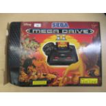 A Sega Mega Drive II  boxed with games: to include Sonic the Hedgehog 2 and Robocop Vs the