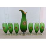 A modern Italian green, clear and gilded glass ewer; and a matching set of six pedestal glasses