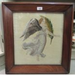 A late Victorian needlework panel, depicting a winged maiden  16" x 15" in a mahogany framed