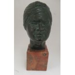 A cast and patinated green bronze bust, a young woman  stamped P Gambino, on a mottled marble plinth