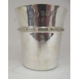 A Scottish silver beaker with a flared rim and cast with Celtic band  Edinburgh 1977