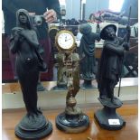 Two black painted cast metal figures, a cloaked nude and a shepherd  14"h; and a bronze effect