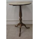An early 20thC light oak pedestal table, raised on a splayed tripod base  28"h  18"dia
