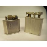 Two vintage silver cased cigarette lighters  mixed marks