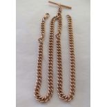A (probably 9ct) gold coloured metal watch chain and T-bar (this item may be tested)