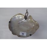 A late 19thC sweet dish, fashioned from a seashell, elevated on a silver plated stand  4"h  7.5"w