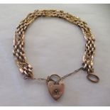 A 9ct gold gatelink bracelet, on a padlock clasp and safety chain