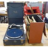 A vintage May-Fair De Luxe Model portable gramophone, in a dark blue fabric case; and a selection of