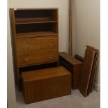 A vintage PS System teak wall unit, comprising an arrangement of open and enclosed shelves, a