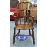 A late 19thC beech and elm framed high back Windsor grandfather chair