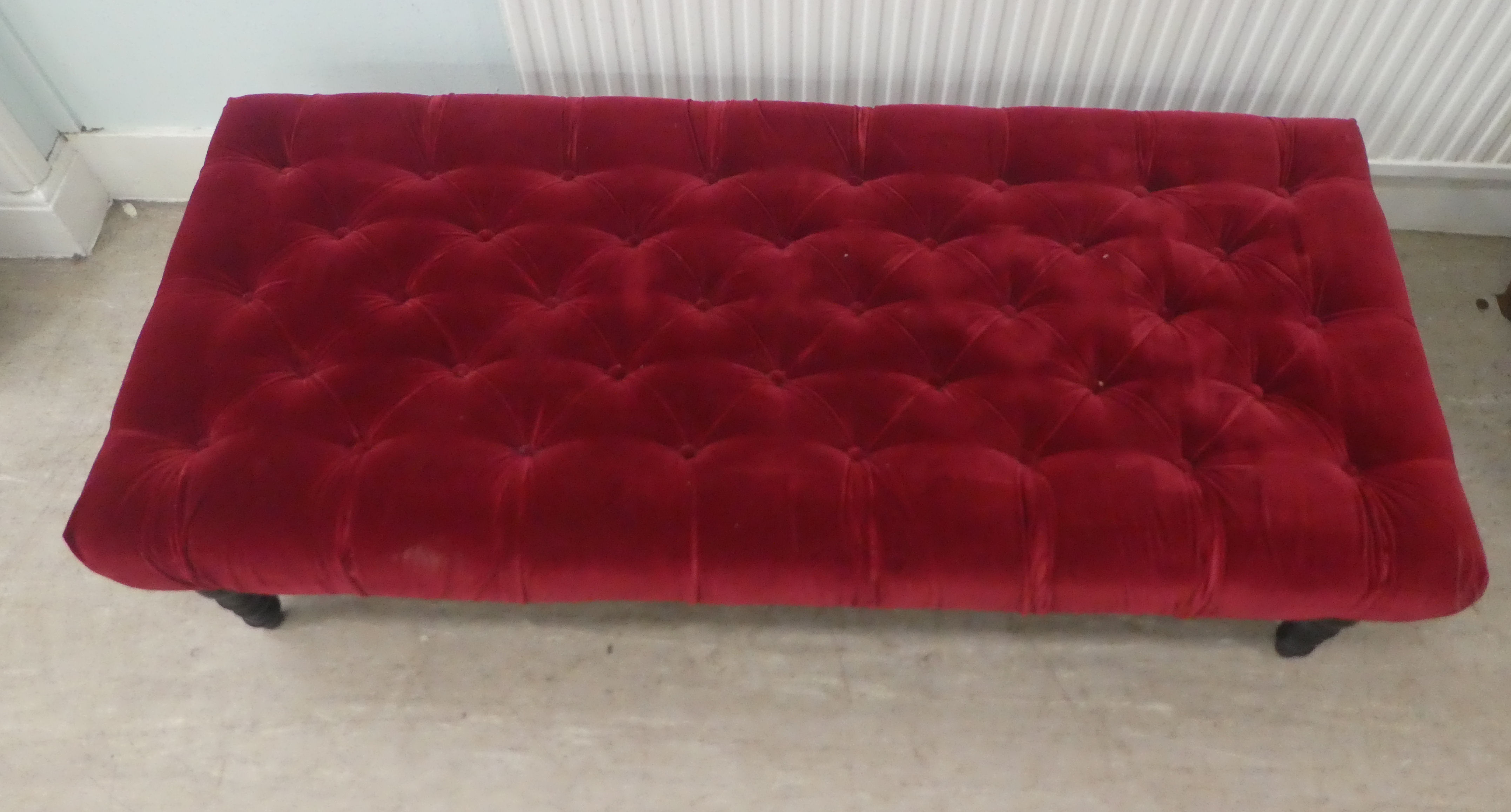A modern footstool, part button upholstered in red fabric, over a stained wooden frame - Image 2 of 5