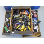 Five crates of uncollated diecast model vehicles: to include black cabs and sports cars with