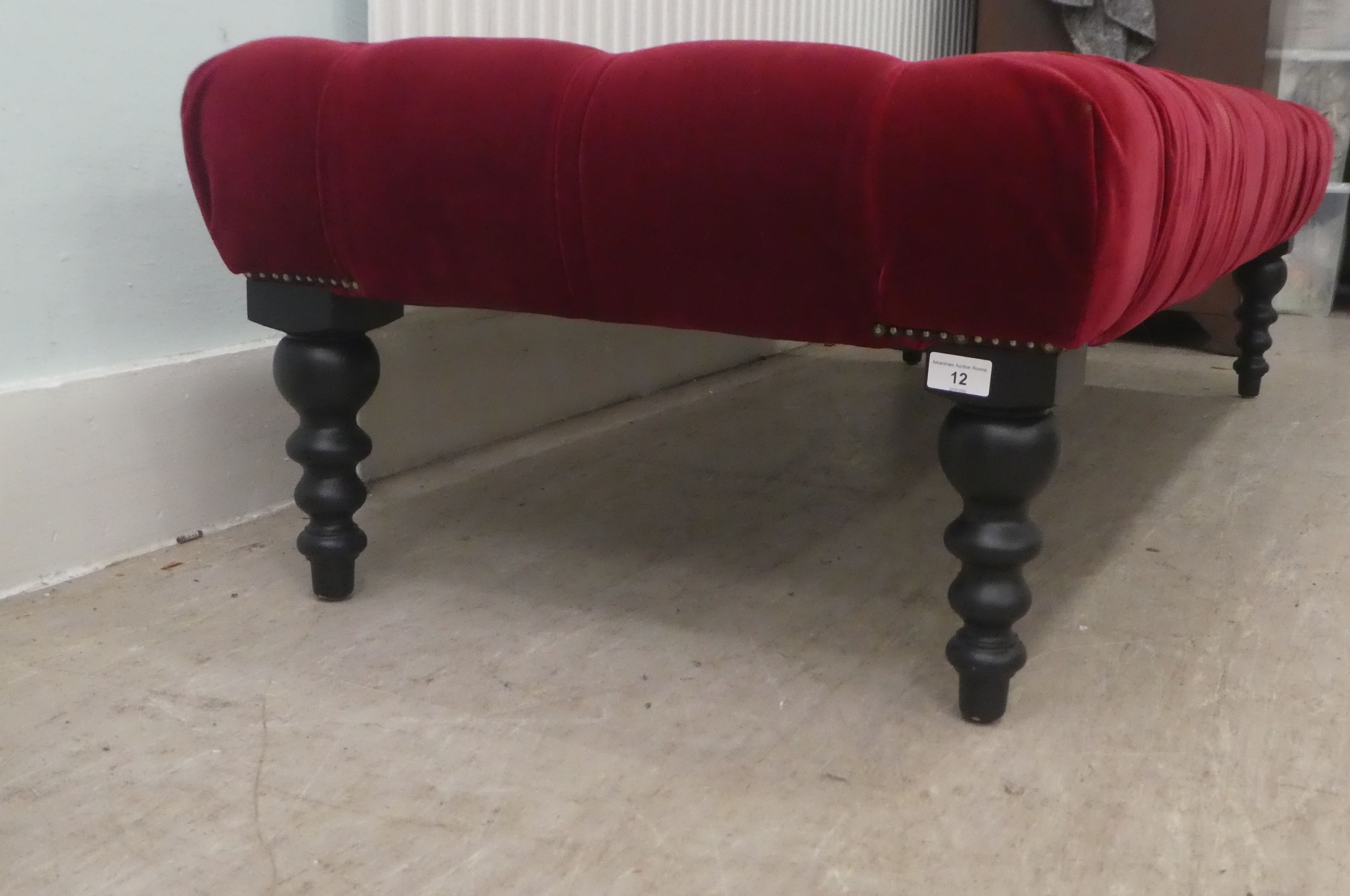 A modern footstool, part button upholstered in red fabric, over a stained wooden frame - Image 3 of 5