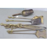 A quantity of mainly 19thC brass fire irons