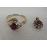 A 9ct gold ruby and diamond set ring and matching pendant