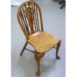 A Stewart Linford yewwood framed Windsor hoop and spindled back chair with a pierced splat and