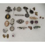 Items of personal ornament: to include a silver brooch; and two Victorian silver coin brooches