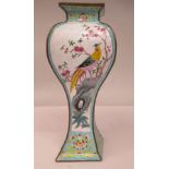 A 20thC Chinese enamelled brass vase of waisted, diamond outlined form, decorated panels with