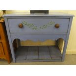 An early 20thC blue wash shabby chic painted single drawer side table, raised on square legs, united