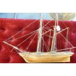 A modern wooden model, a twin mast sailing vessel 'Scottish Maid' 18"L in a stand