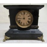 An early 20thC slate and faux marble mantel clock; the movement faced by a Roman dial, raised on