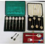 A set of six silver miniature reproduction of early anointing spoons  cased; a set of six silver