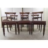 A set of six William IV framed round bar crest dining chairs with carved horizontal splats, the faux