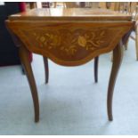 A modern Italianate kingwood and marquetry side table with four shaped fall flaps, raised on