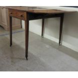 A George III string inlaid crossbanded mahogany Pembroke table, raised on square, tapered legs  29"h