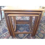 A nesting set of three G-Plan teak occasional tables  largest 20"h  20"w