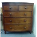 A late Victorian mahogany bow front dressing chest with two short/three long drawers and bun